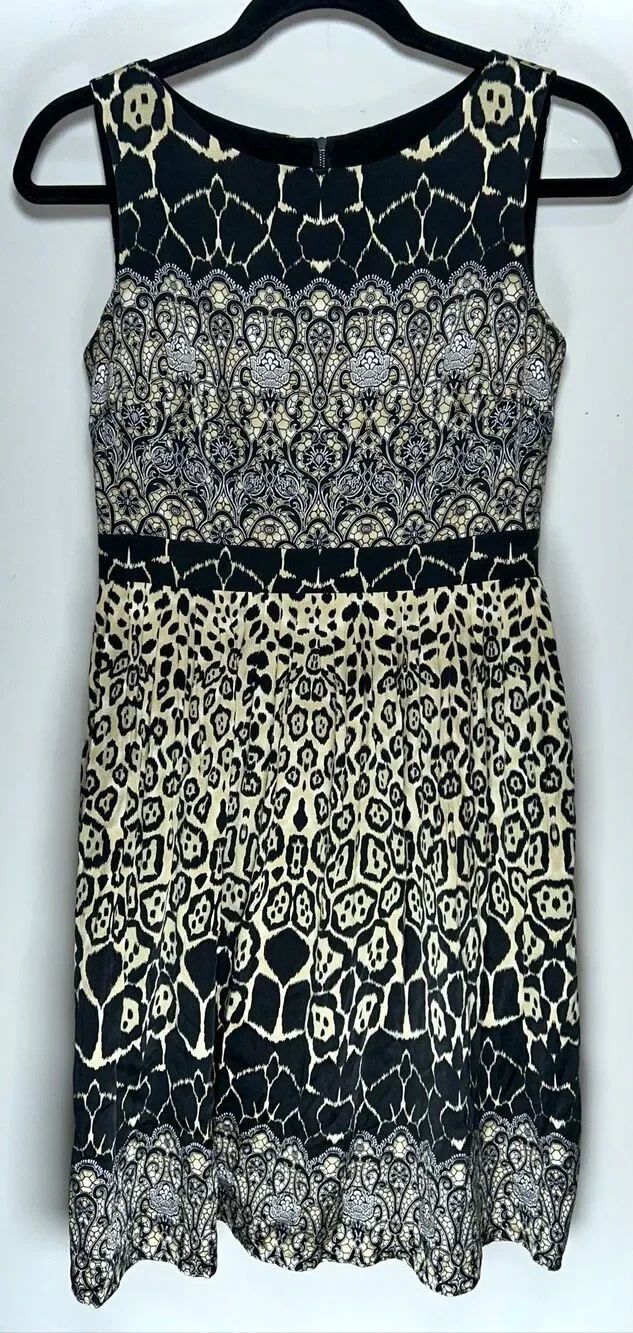 Kay Unger cocktail dress features a black and beige silk blend with a mixed patt